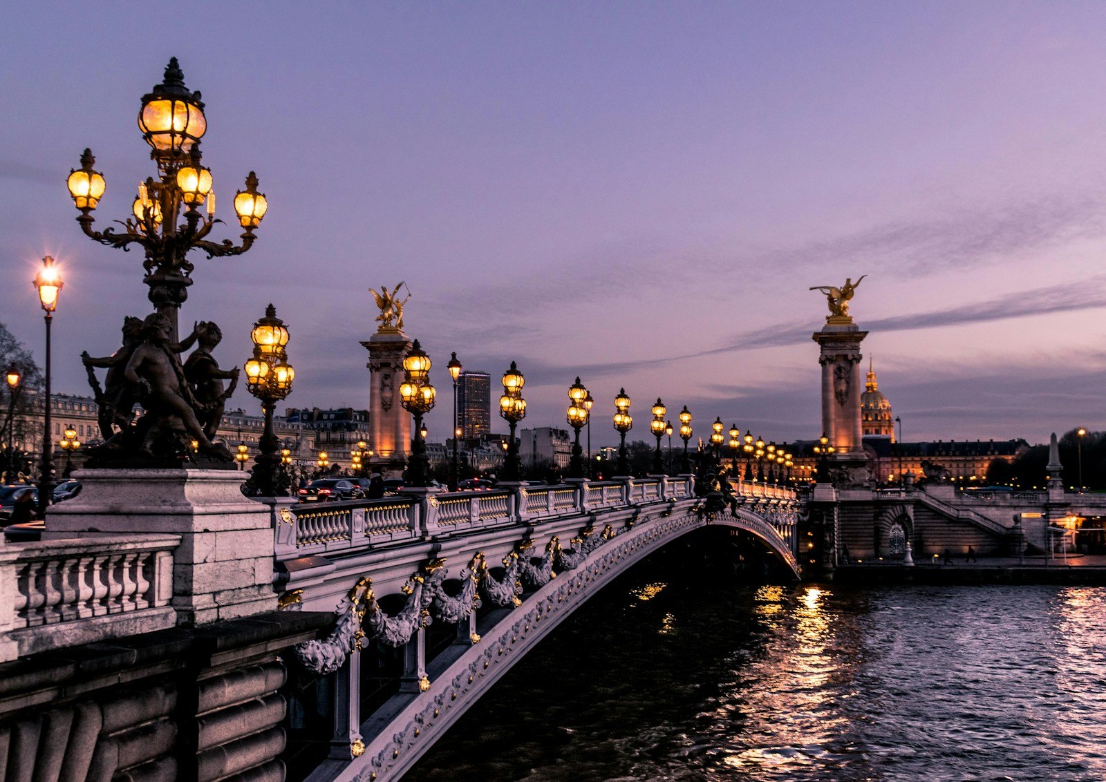 Pont Alexandre III with lights over water